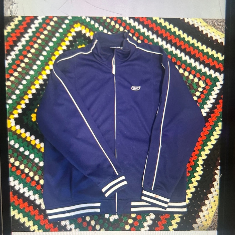 Navy blue vintage 90’s rebook track jacket with white stripes